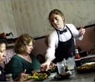 Emily Hall, a Los Gatos Cafe waitress for the past 11/2 years, serves breakfast to Mary Eros (left), Liliana Wolpern (second from left) and Elizabeth Wolpern (far right). Photo by Paul Myers