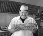 Rib Tickler: Baby back ribs are among the multinational offerings at Uncle Ray's. Photo by Christopher Gardner