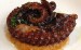 The Pulpo a la plancha con romesco (grilled octopus with romesco sauce) at Donostia.